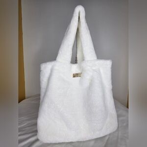 NWOT Good Girl By Carolina Herrera -11" X 16"inch-Elegant White FauxFur Tote Bag